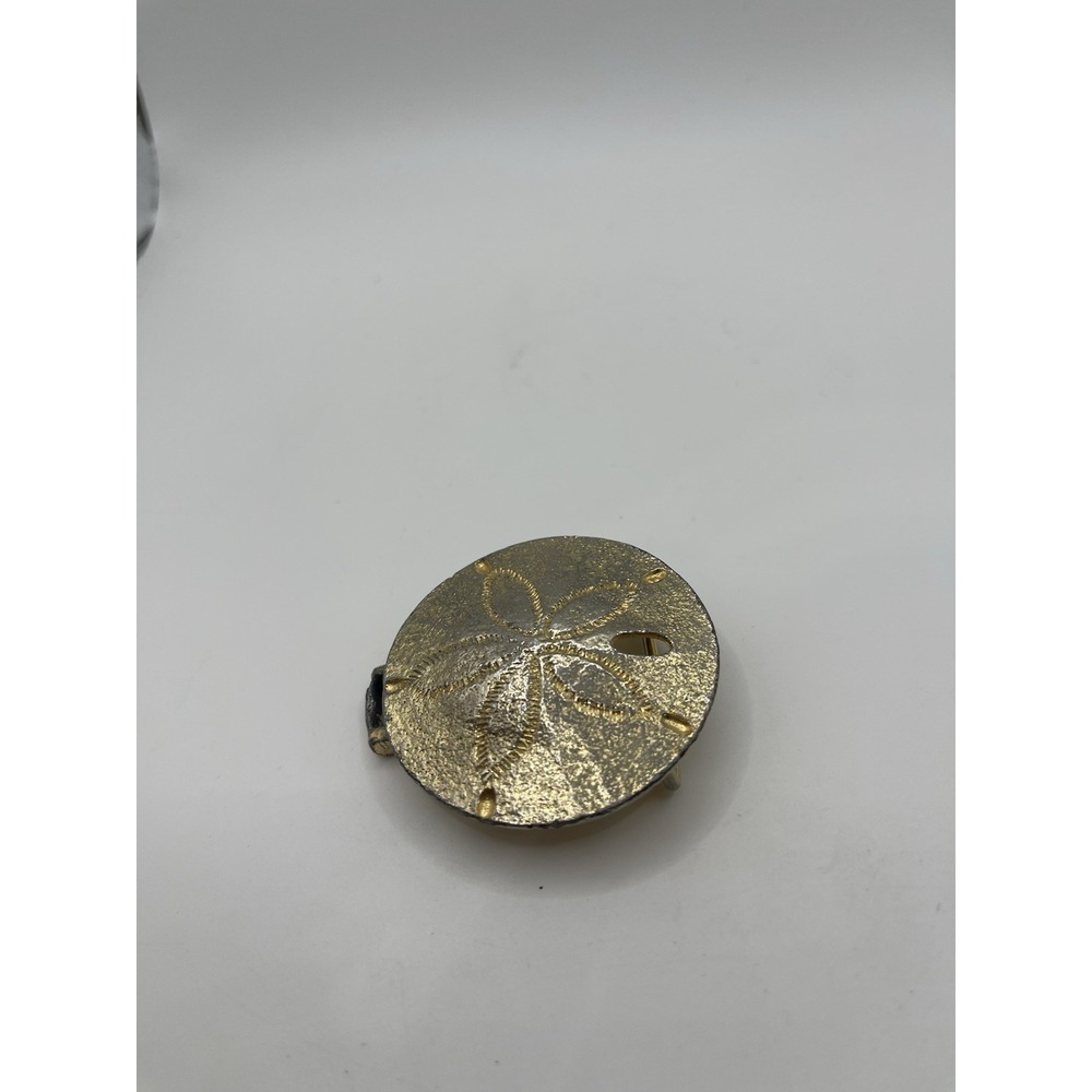 VINTAGE SIGNED DOTTY‎ SMITH GOLD TONED SAND DOLLAR BELT BUCKLE.